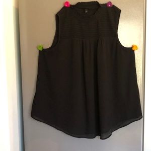 Torrid. Women’s black sleeve blouse with smocked neck line. Size 3X.